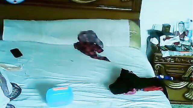 Egyptian wife messy bed with scattered clothes and panties