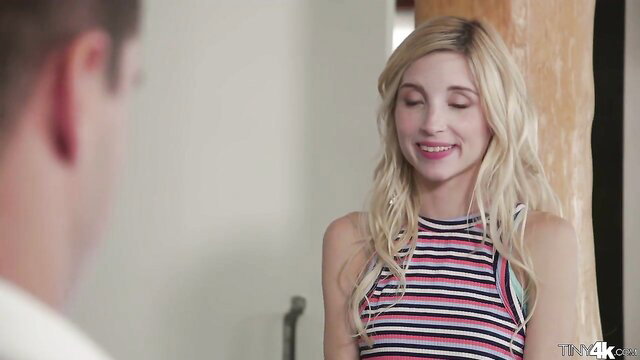 Piper Perri in striped tank top smiling seductively