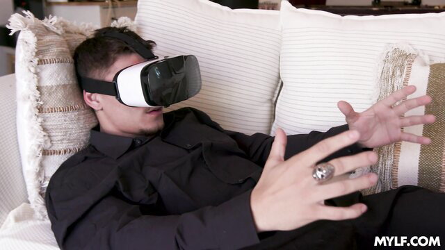 POV guy in VR headset reclines as MILF preps wild cowgirl ride