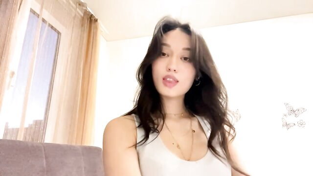 Bella Gasp new shy young Asian teen in tight tank top, cleavage tease