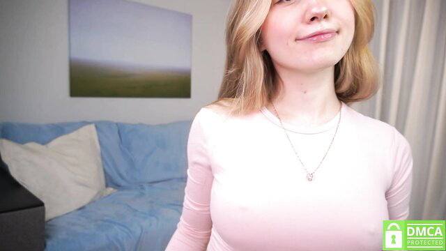 _miracle_keen_ shy 18yo blonde in tight pink top smiling closeup