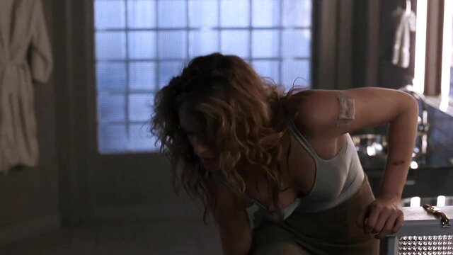 Cindy Crawford in Fair Game 1995, topless leaning over sink in tank top