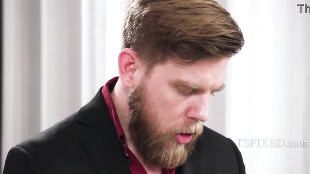 Bearded Steve Rickz in suit smirks closeup in HD Poker To Shove Her video