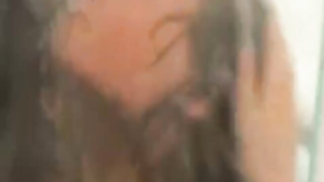 Blurry thumbnail of two women in rough lesbian sex embrace