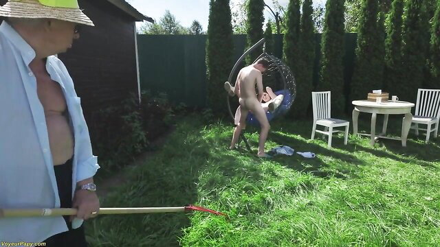 Old man watches BF fuck Remida in swing outdoor threesome