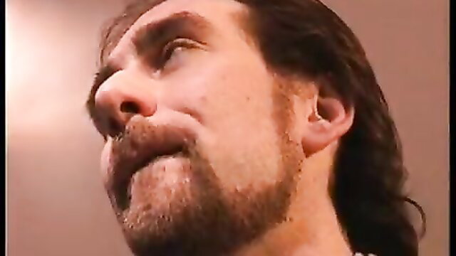 Closeup of slutty businessman with beard and long hair in gangbang preview