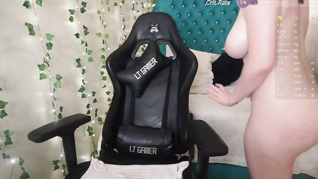 Nude teen webcam girl posing topless by gaming chair